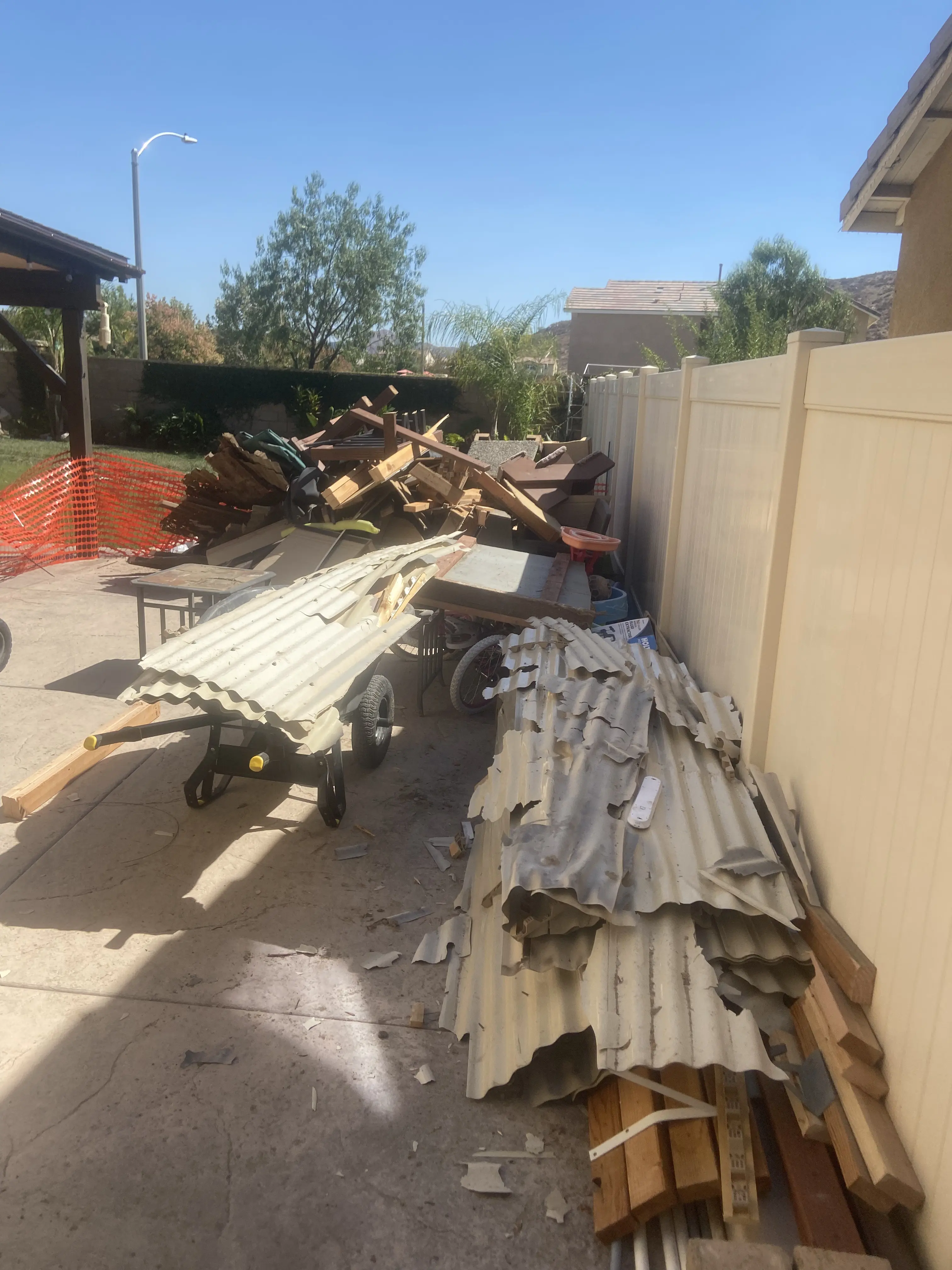 Before: Garage filled with junk, then clean